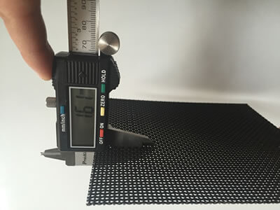 It demonstrates the measuring result of a security screen' mesh size as an example.